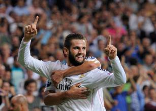 MADRID, SPAIN - SEPTEMBER 16:  Nacho Fernandez of Real Madrid celebrates after scoring Real's opening goal during the UEFA Champions League Group B match between Real Madrid CF and FC Basel 1893 on September 16, 2014 in Madrid, Spain.  (Photo by Denis Doyle/Getty Images)
