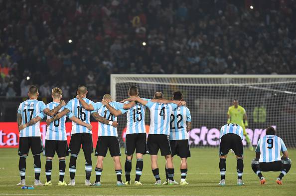 Argentinian players watch the 2015 Copa America final football match penalty shootout against Chile, in Santiago, Chile, on July 4, 2015. Chile won by 4-1 (0-0). AFP PHOTO / NELSON ALMEIDA (Photo credit should read NELSON ALMEIDA/AFP/Getty Images)