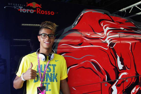 MONZA, ITALY - SEPTEMBER 07:  Young Morrocan footballer Hachim Mastour of AC Milan is seen in the Scuderia Toro Rosso garage before the qualifying session for the Italian Formula One Grand Prix at Autodromo di Monza on September 7, 2013 in Monza, Italy.  (Photo by Ker Robertson/Getty Images)