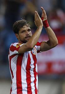 Atletico Madrid's Diego celebrates after scoring a goal against Celtic during their Europa League Group I soccer match in Madrid